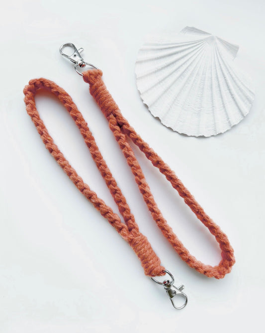 coral macrame wristlet