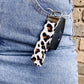 white leopard wristlet